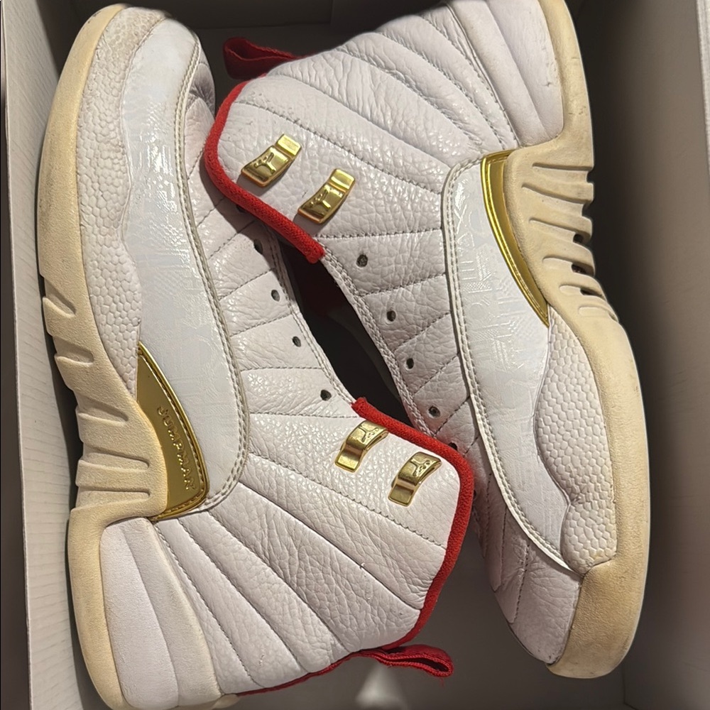 Air Jordan 12 Retro White and Gold Sneakers